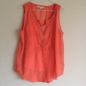 Coral pink flouncy blouse.
